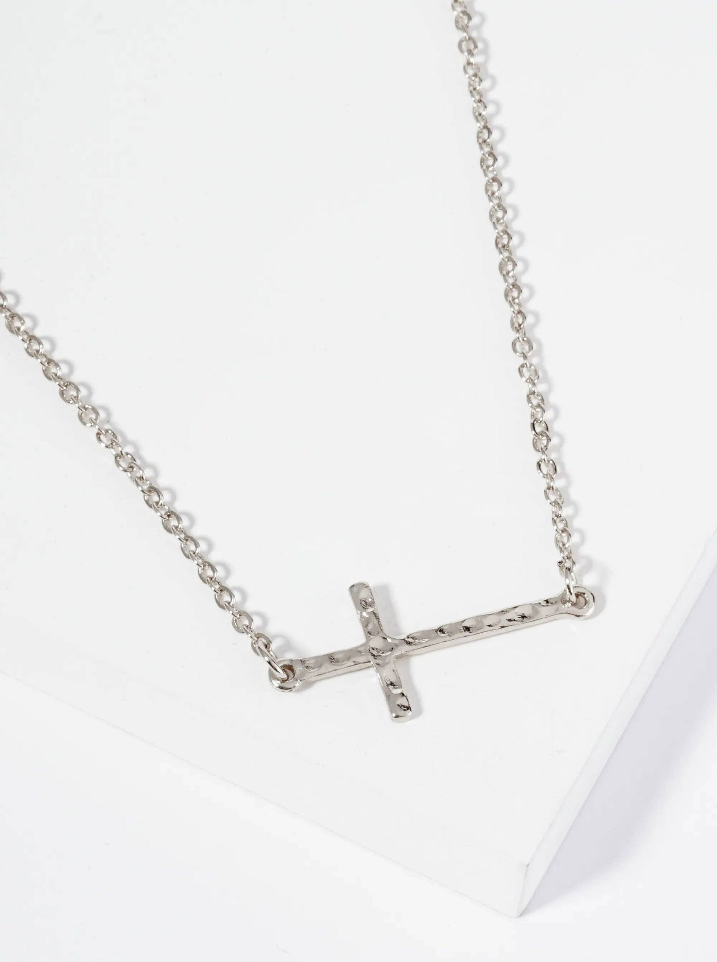 Hammered Metal 1 Inch Sideways Cross Pendant Necklace: Rhodium
