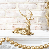 8.5" Gold Laying Reindeer