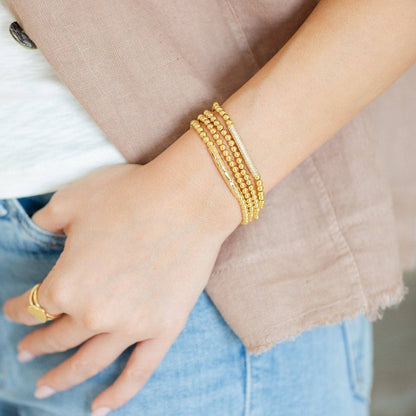 Gold Beaded Bracelet with Lightly Textured Bar